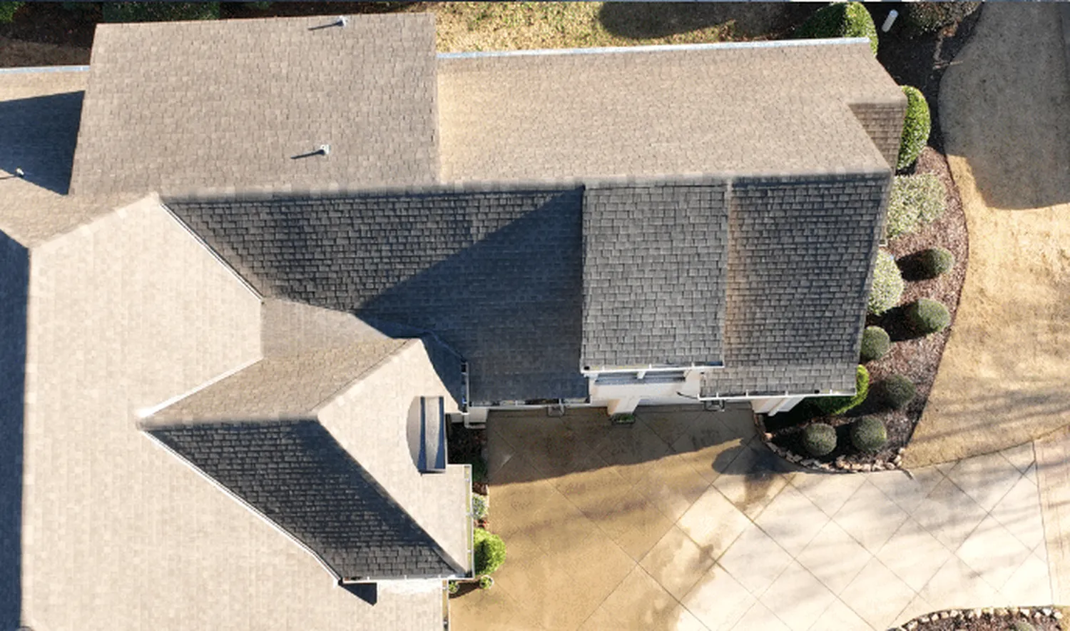 After treatment — aerial view of a full residential roof